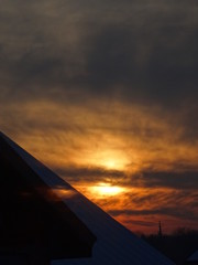 airplane in the sky at sunset