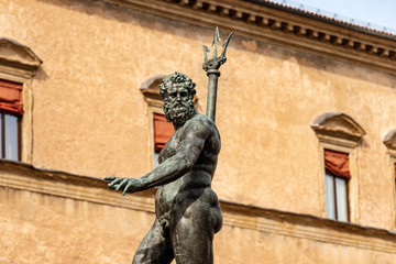 Obraz premium Closeup of the bronze statue of Neptune (1566), Roman God, fountain in Piazza del Nettuno, Bologna, Emilia-Romagna, Italy, Europe. Artist Giambologna (1529-1608)
