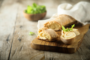 Homemade baguette bread on a wooden desk