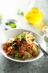 Spaghetti with vegetable ragout and fresh parsley