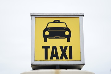 Yellow Taxi stand, cabstand sign   
