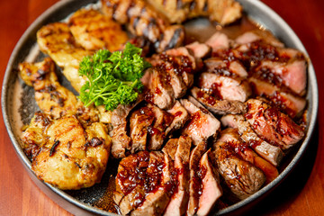 Fresh, juicy assorted sliced grilled meat.