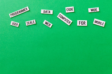 Code computer programmer data text on green background. Flat color design computer for advertising in green mobile technology. ecology and mobile web developer. Green coding