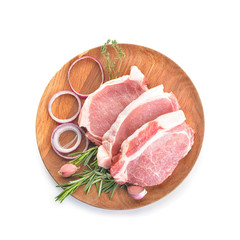 Plate with raw pork meat on white background