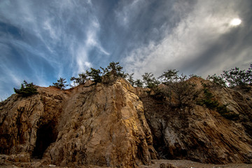 Between the sky and the cliff.