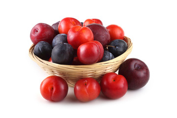 Plums isolated on white