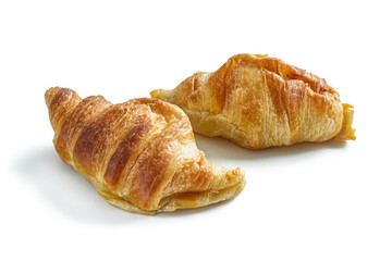 Delicious fresh croissants on a white background