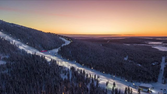 Hyperlapse video of the ski slopes of Levi ski resort at sunrise, Kittil&auml;, Finland. A wintery landscape in Finnish Lapland.