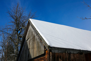 barn roof covered with snow