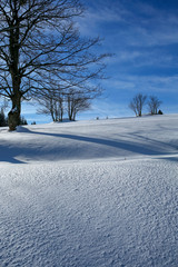 snowy mountain hills at sunny day