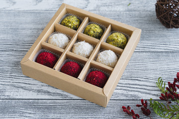 Multi-colored candy in a gift box. Holidays and greetings