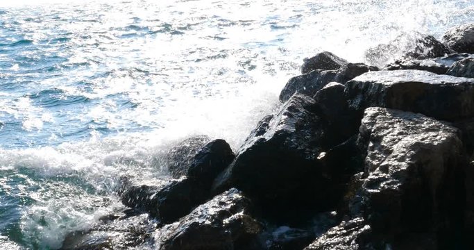 Stones on the beach. The waves of the sea beat against the rocks on the shore. Beautiful view of the sea.  , Waves on the Caribbean Sea.