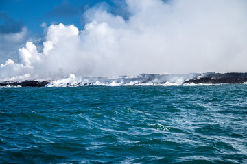 Fototapeta premium lava coast steam rising to the sky