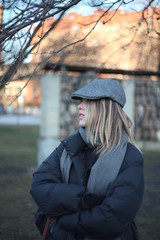 Closeup portrait of a beautiful girl in a cap