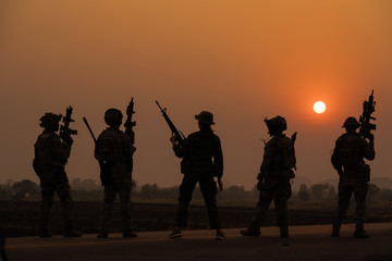 Fototapeta na wymiar silhouette action soldiers