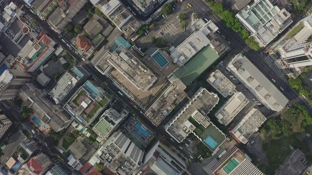 Bangkok Thailand Aerial v175 Vertical view flying over downtown skyscrapers in Watthana and Pathum Wan districts - January 2020