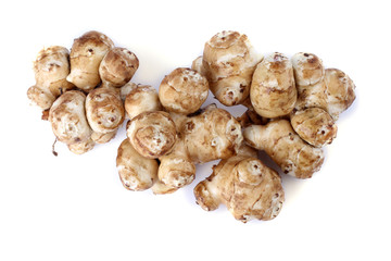 Jerusalem artichokes isolated on white
