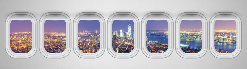 Fototapeta na wymiar Manhattan night skyline as seen from airplane windows, New York City. Business, travel and holiday concept abstract