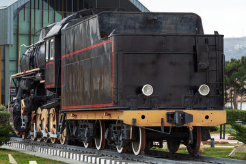 Fototapeta na wymiar Old steam train in the park
