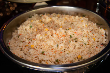 Asian style fried rice on a large buffet pan.