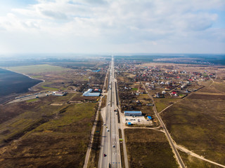 View from the drone of the asphalt road to the city. Ukraine.