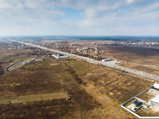 View from the drone of the asphalt road to the city. Ukraine.