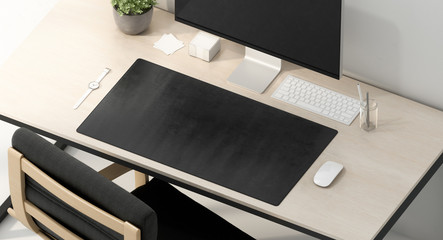 Blank black desk mat on work table mockup, top view