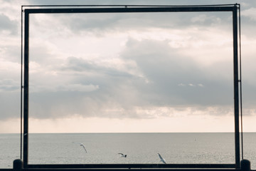 Frame and sea cloudy landscape