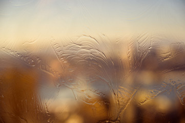 Frozen glass - natural winter background.