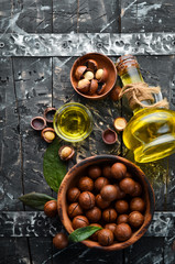 Vegan oil. Macadamia nut oil. Top view. Free space for your text.