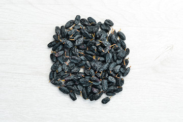 Dried fruits. Raisins made of blue grapes. Top view.