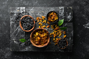Delicious sweet raisins from grapes. Dried fruits. Top view. Free space for your text.