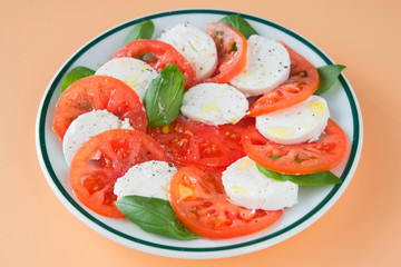 Caprese salad in brown background