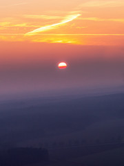 sunset over a soft landscape