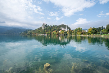 Fototapeta premium Landscapes of Bled Castle in front in Bled Lake, Slovenia