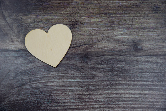 heart on wooden background photo