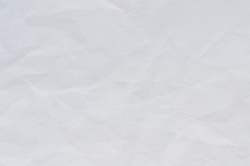 white crumpled paper texture background.