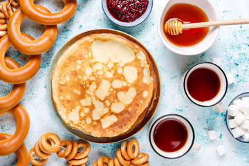 Shrovetide Maslenitsa festival meal. Russian pancake blini with raspberry jam, honey, fresh cream...