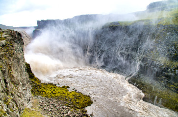 Dettifoss waterfalls in Iceland on a cloudy day