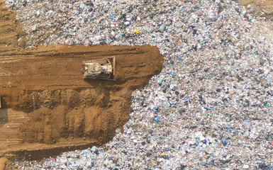 Waste disposal pile of plastic garbage and various trash aerial view by drone.recycling and...