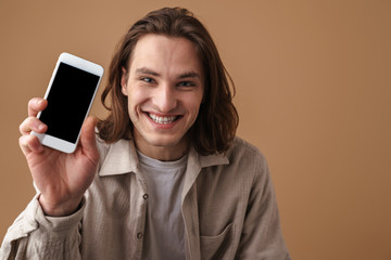 Fototapeta premium Cheerful young attractive man wearing casual clothes