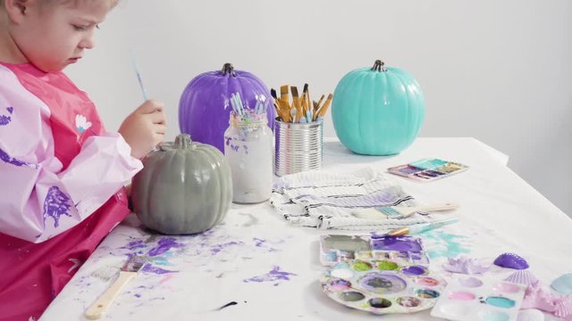 Step by step. Painting craft pumpkin with acrylic paint to create decorated mermaid Halloween pumpkin.
