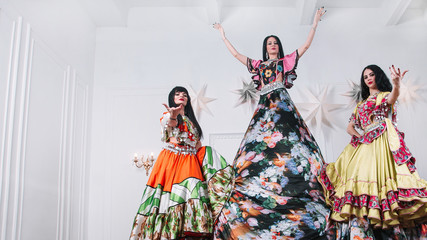 Obraz premium Gypsy dance group performing at the festival of folk art.