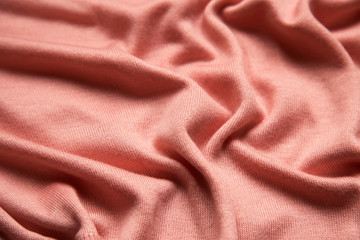 pink sweater texture, close up view