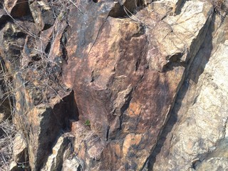 Closeup of the coloured weathering on natural rock.