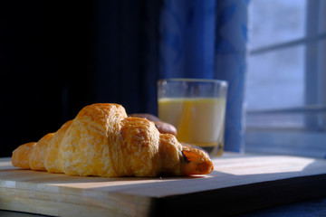 Close up of bakery food and milk on table 