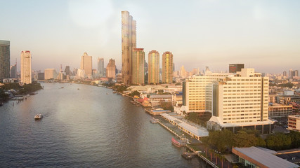 Bangkok, Thailand. Aerial view of cityscape and Chao Phraya River ar sunset