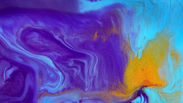 Abstract texture flowing in chaotic. Fluid art painting. Modern fluid painting artwork. Colourful liquid motion creative backdrop with beautiful liquid flows and mixes. Purple, blue and gold colour