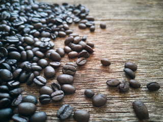 Coffee beans on rustic wood