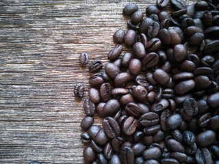 Coffee beans on rustic wood